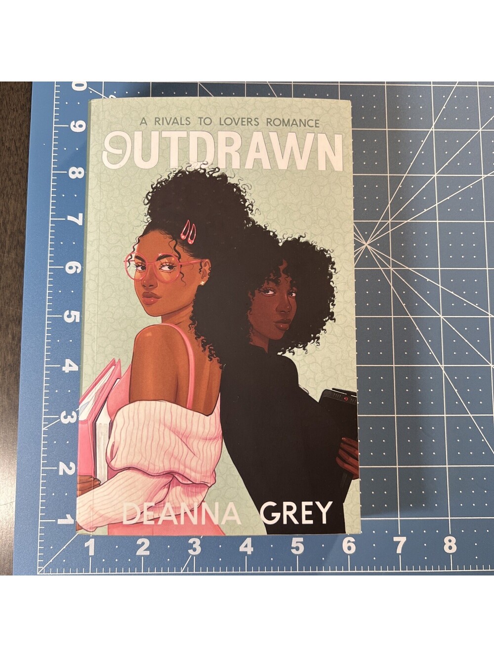 Outdrawn: A Rivals to Lovers Romance by Deanna Grey